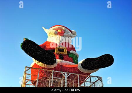 Giant Santa model in Piccadilly Gardens,Manchester UK Stock Photo