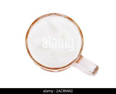 glass of fresh lager beer on white table Stock Photo