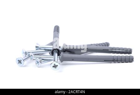 Screws and dowels isolated on white background Stock Photo