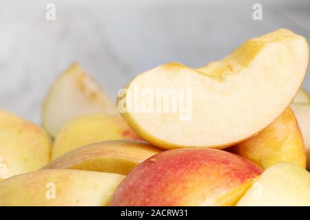 Slices of fresh red apple. a fresh apple quarter Stock Photo