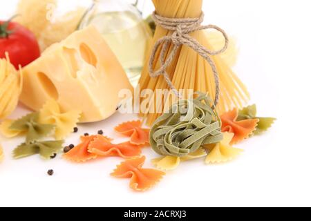 Different pasta, oil, tomato, cheese Stock Photo