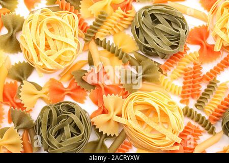 Different pasta in three colors. Stock Photo