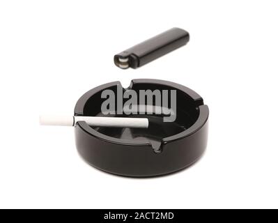 Black ceramic ashtray, cigarette, lighter. Stock Photo