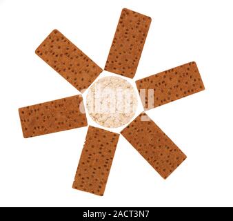 Composition of corn cracker and bread crisps. Stock Photo