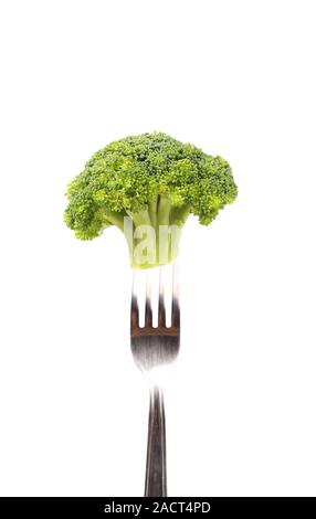 Broccoli impaled on a fork. Stock Photo