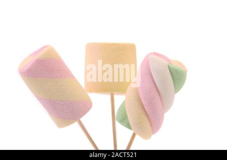 Three different marshmallow on a sticks. Stock Photo