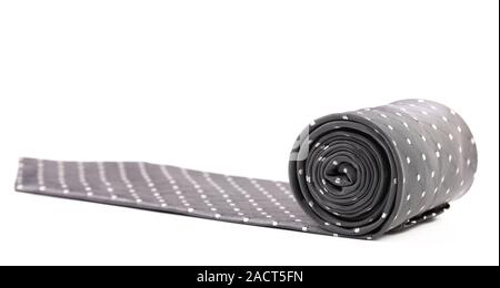 Folded gray tie with white speck. Stock Photo