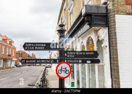 Signpost pointing to local amenities and attractions in Lymington, New Forest district of Hampshire, southern England, UK Stock Photo