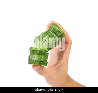 Hand holds stack juicy cucumber Stock Photo