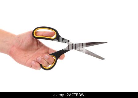 Male hand holding scissors. Stock Photo