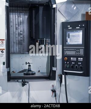 Modern industrial production CNC vertical machining center Stock Photo