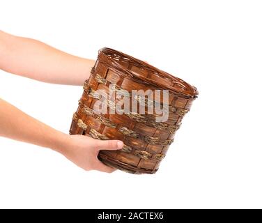 Hand holds basket. Stock Photo