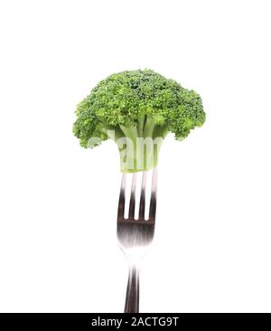 Broccoli impaled on a fork. Stock Photo