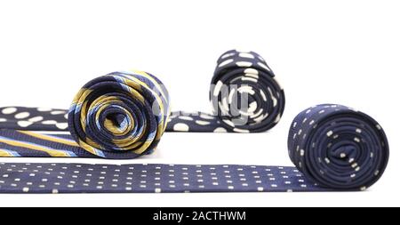 Bright rolled ties isolated on white Stock Photo