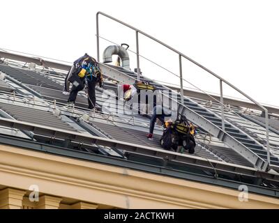 Roofers working on the roof Stock Photo