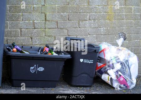 Aberystwyth Ceredigion/UK December 3 2019:  Kerbside glass, waste food and mixed recycling containers used in Ceredigion, Wales, UK Stock Photo
