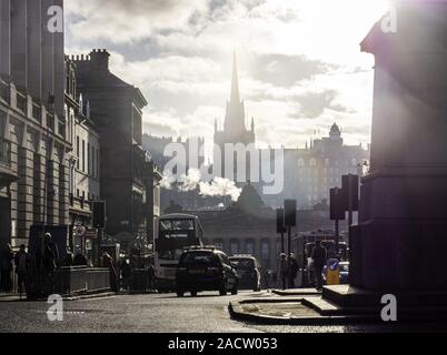 Edinburgh, Scotland - 12/01/2019: Silhouettes and outlines from the streets and alleyways of Edinburgh in Scotland. Sunrays and bokeh effects hit the Stock Photo