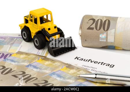 Purchase contract for new excavator Stock Photo