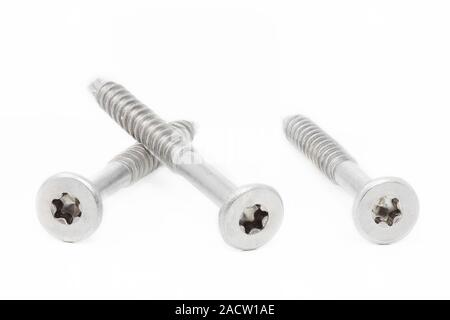 Wood screws on white background Stock Photo