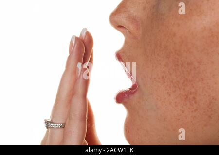 young woman yawns Stock Photo