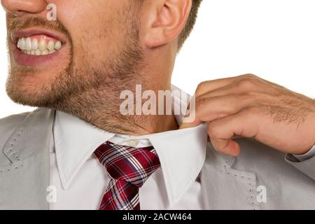 Man bursts his collar Stock Photo