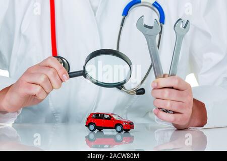 Car is examined by doctor Stock Photo