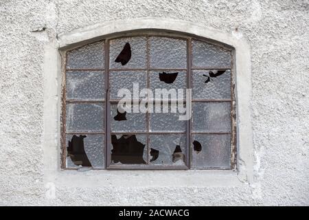 Window with broken panes Stock Photo