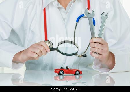 Car is examined by doctor Stock Photo