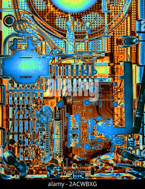 Radio circuit board, coloured X-ray. Stock Photo