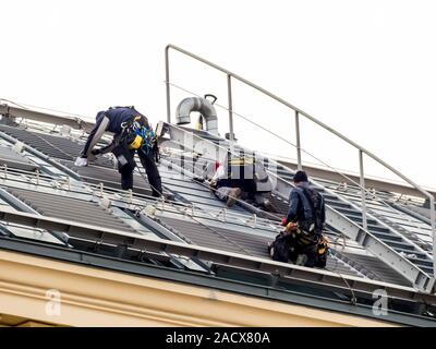 Roofers working on the roof Stock Photo