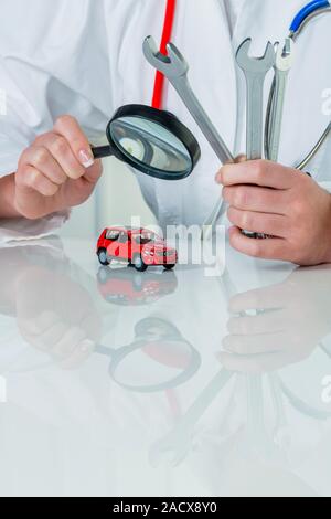 Car is examined by doctor Stock Photo