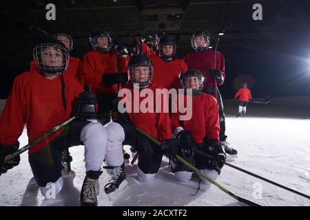 happy children gropu  hockey team sport players Stock Photo