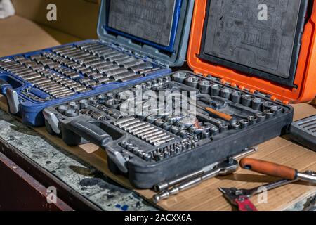 Set mechanical tools. Professional car mechanic using different tools for working in auto repair service. Stock Photo