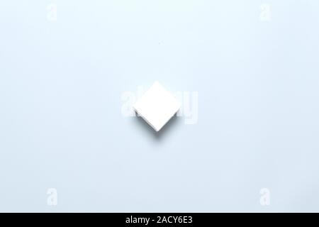 White generic box for mockup product presentation on blue background Stock Photo