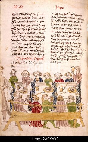 Medieval feast. Medieval manuscript with an image depicting a gathering at a table. Stock Photo