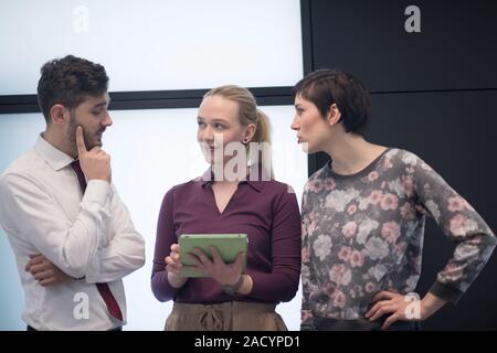 young Business people group working on tablet Stock Photo