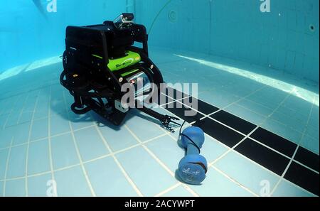 Underwater reconnaissance vehicle testing. SeaBotix underwater reconnaissance vehicle undergoing pool tests. Photographed in Bahrain, in 2012. Stock Photo