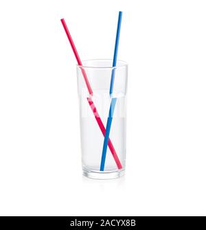 Refraction of the image of drinking straws in a glass of water. The image of each straw has been displaced from that suggested by the straw's position Stock Photo