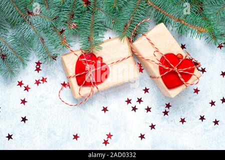 Small Handmade gift boxes in shiny blue night Stock Photo