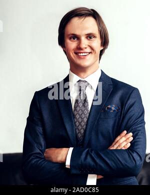 successful young entrepreneur standing in his office Stock Photo