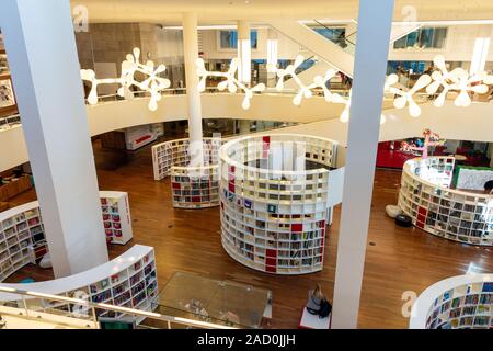AMSTERDAM - AUG 27, 2014: Inside view of Amsterdam Central Library, the Centrale Bibliotheek, designed by Jo Coenen. Stock Photo
