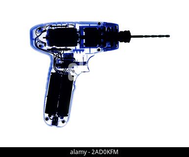 Power drill, coloured X-ray. Stock Photo