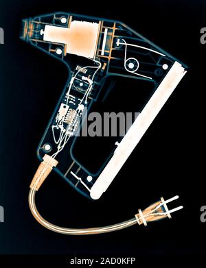 Stapler, coloured X-ray. Stock Photo