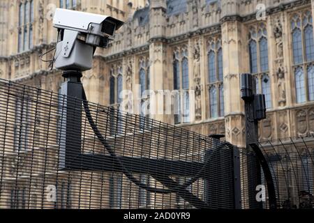 Houses of Parliament security camera. Security camera on a fence at the Palace of Westminster (Houses of Parliament), London, UK. Stock Photo