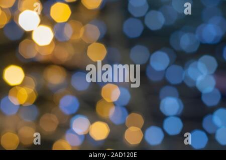 Hexagonal glare multicolor backdrop. Abstract textural background. Bokeh Stock Photo