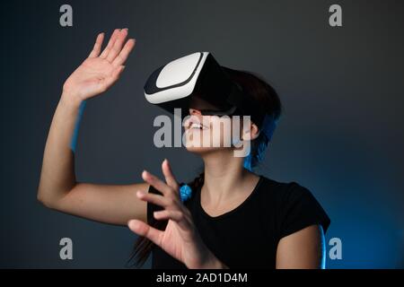 Woman using the virtual reality headset Stock Photo