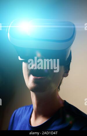 Man wearing virtual reality goggles. Stock Photo