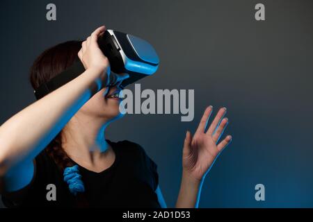 Woman using the virtual reality headset Stock Photo