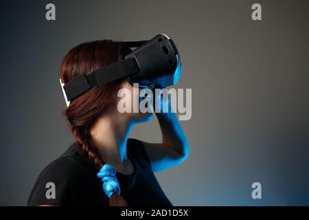 Woman using the virtual reality headset Stock Photo