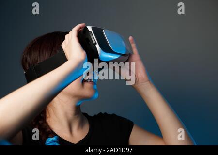 Woman using the virtual reality headset Stock Photo